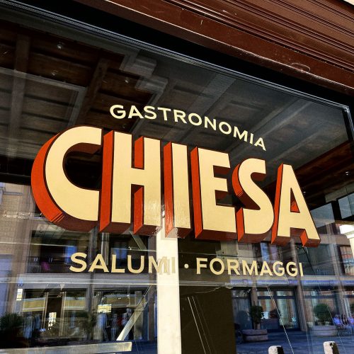 Gastronomia Salumeria Chiesa - insegna vetrina dipinta a mano a Magenta
